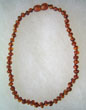 Collier ambre bb boules cognac