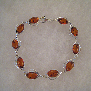 Bracelet ovale accompagn d'argent - bijou ambre et argent