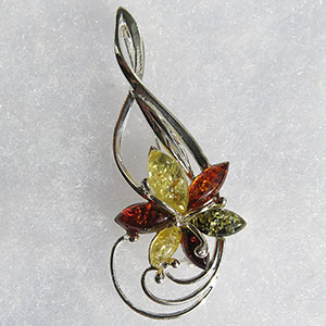 Broche fleur cl de sol  - bijou ambre et argent