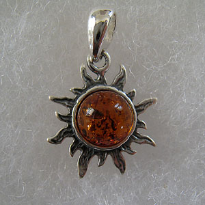 Pendentif  soleil miniature - bijou ambre et argent