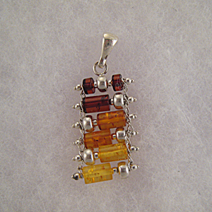 Pendentif rouleaux - bijou ambre et argent