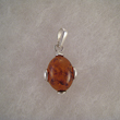 Pendentif boule d'ambre ovale 