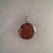 Pendentif boule cerne