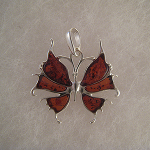 Pendentif papillon ferique  - bijou ambre et argent