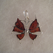 Pendentif papillon ferique 