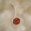 Pendentif perle incurve