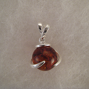 Pendentif petite boule enroul  - bijou ambre et argent