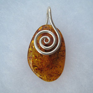 Pendentif spirale - bijou ambre et argent