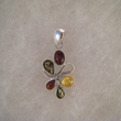 Pendentif tortillon boule multicolore 